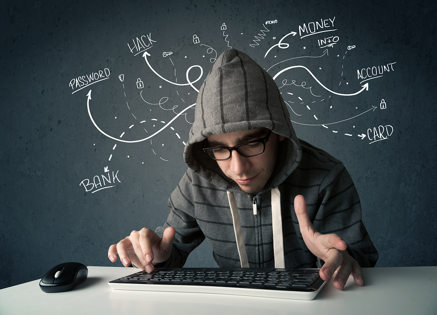 bigstock-Young-dangerous-hacker-with-wh-65945554.jpg